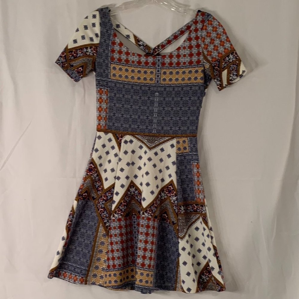 H & M Divided Geometric Multi Clr. Mini Flare Dress with an X  on the back. SZ 4